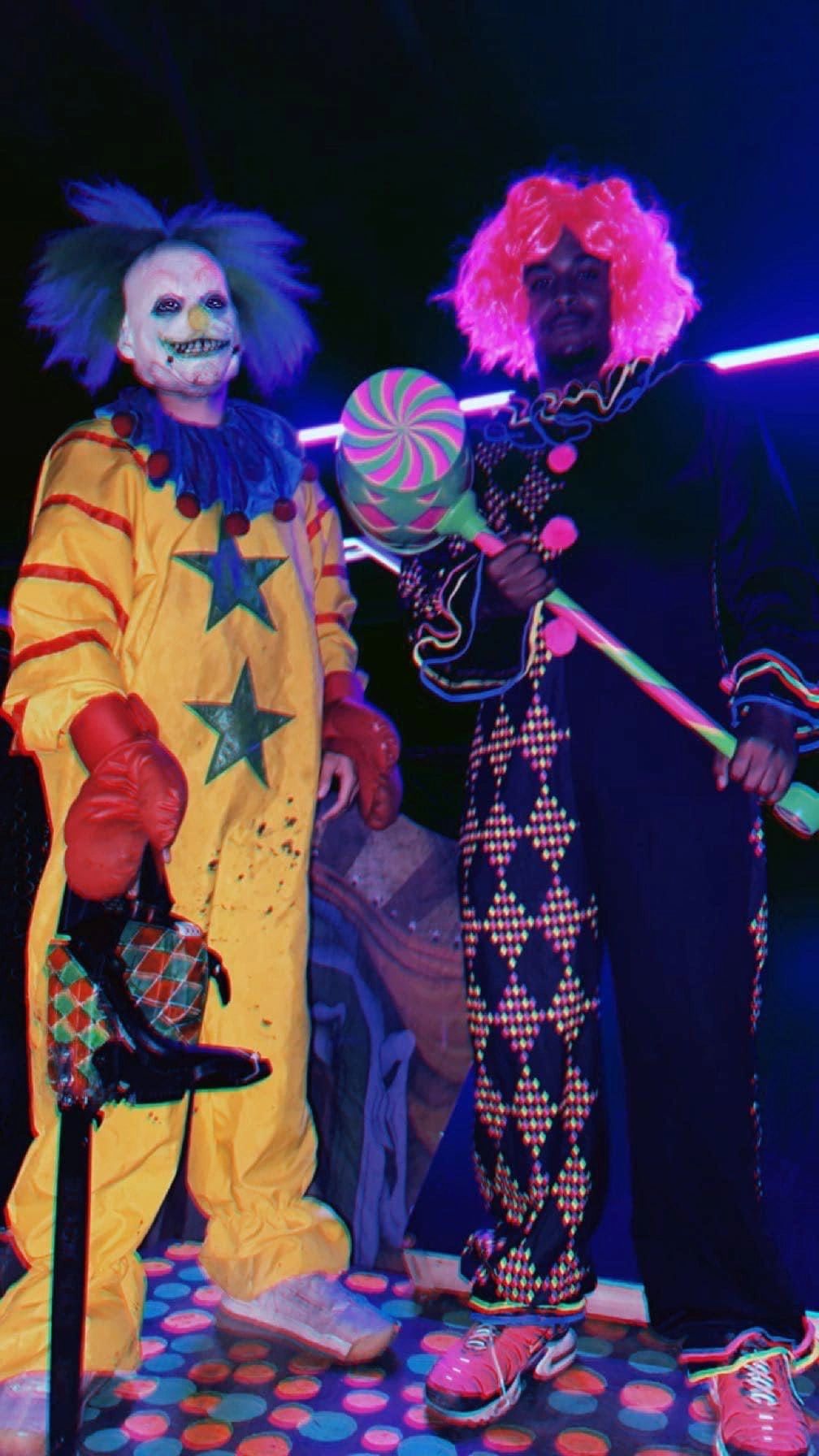 Neon clown costumes at the Haunted Hotel